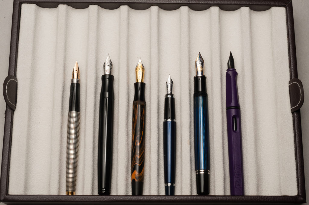 Unposted pens from left to right: Parker 75, Franklin-Christoph Model 20, Edison Beaumont, Pilot Stargazer, Pelikan M805, and Lamy Safari