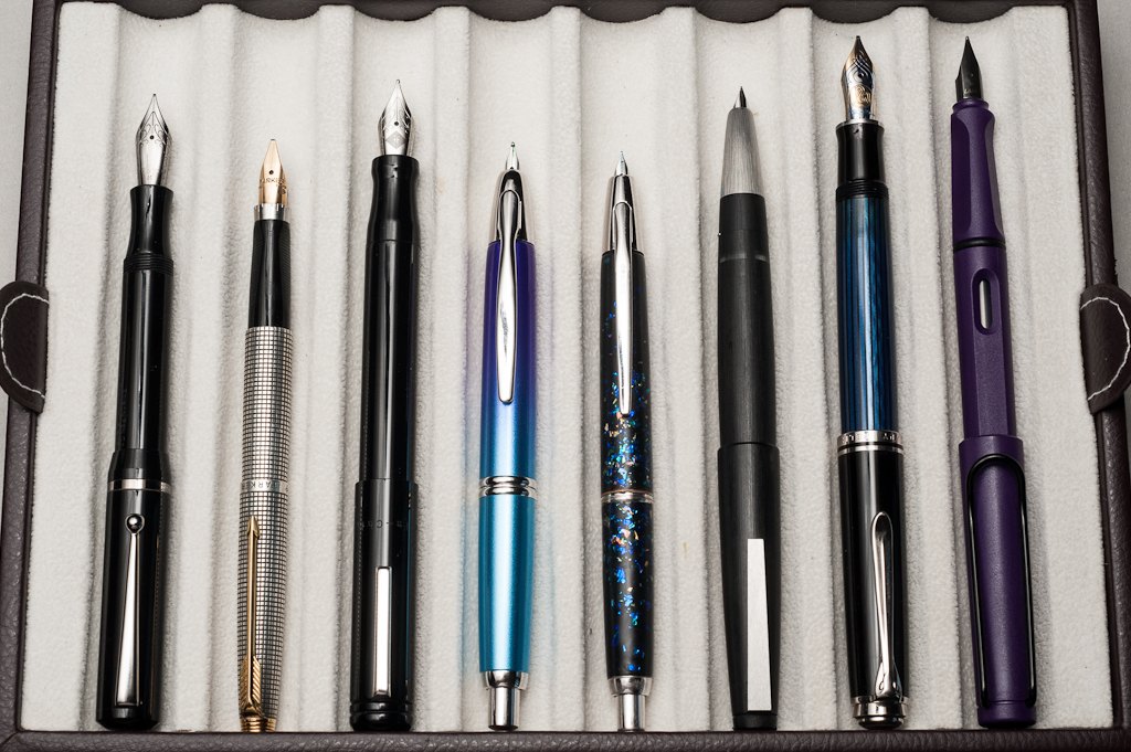 Posted pens from left to right: Edison Beaumont, Parker 75, Franklin-Christoph Model 20, Pilot Vanishing Point, Pilot Vanishing Point Decimo, Lamy 2000, Pelikan M805, and Lamy Safari